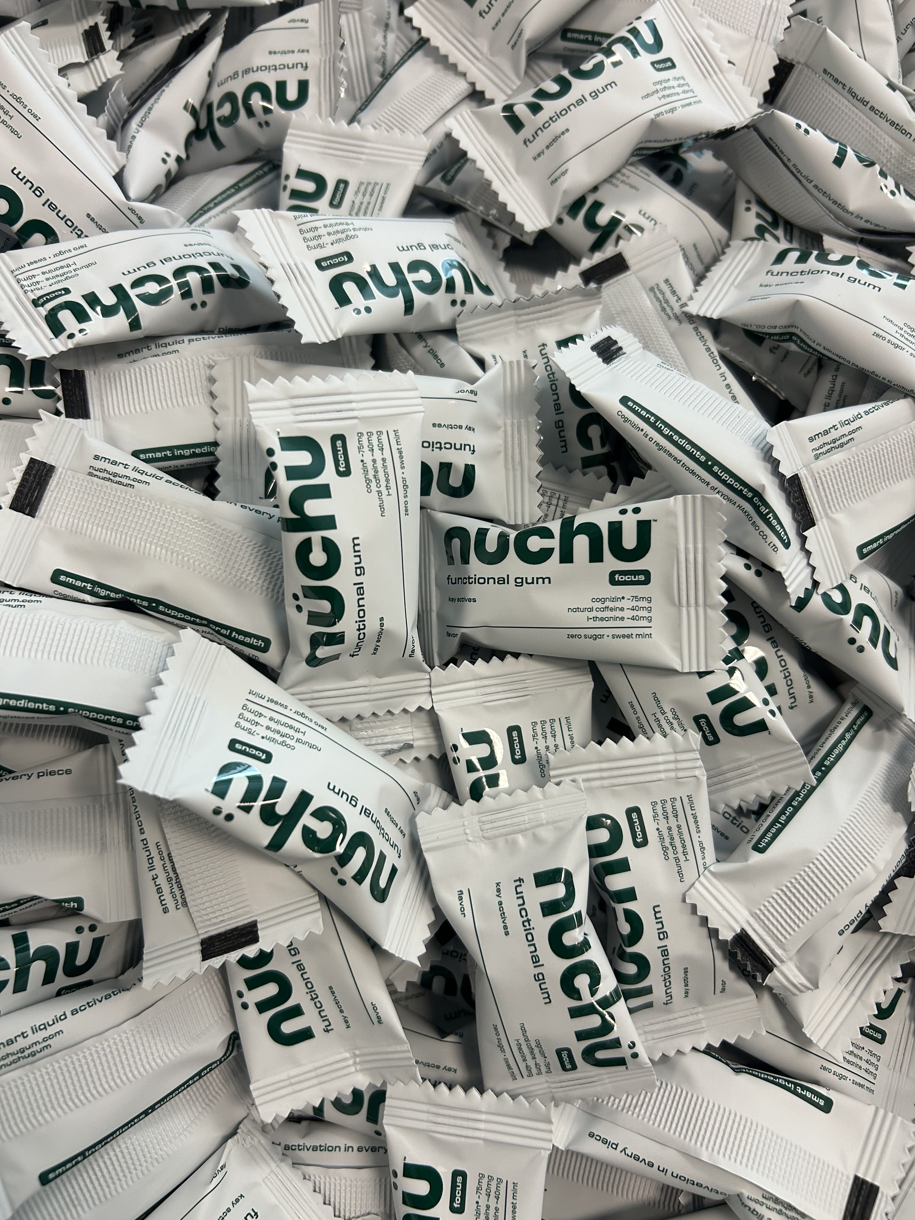 A pile of individually wrapped nüchü chews